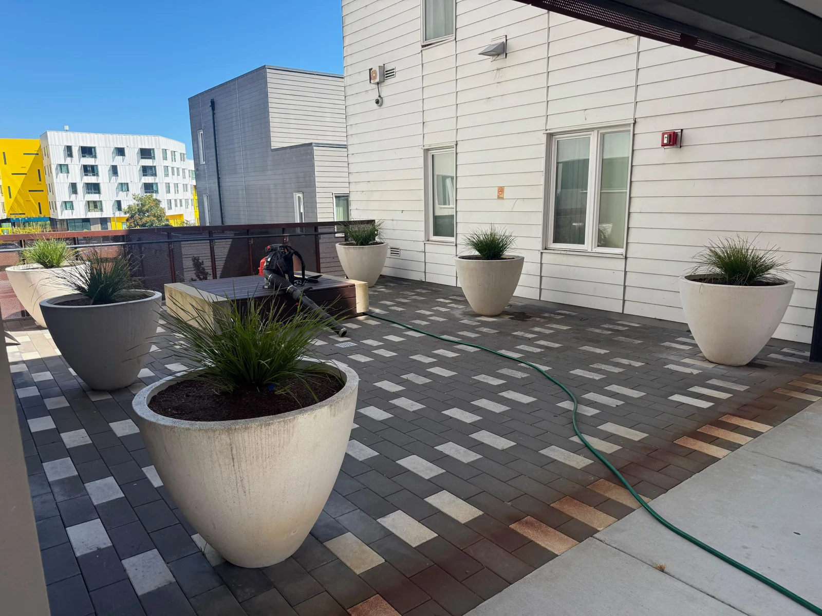 Courtyards & amenities at a Green Is The Way maintained property, view 1